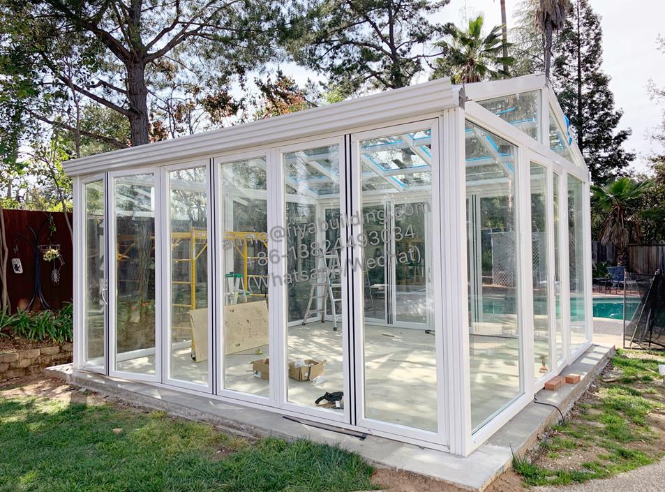 White frame color glass sunroom installed1.jpg